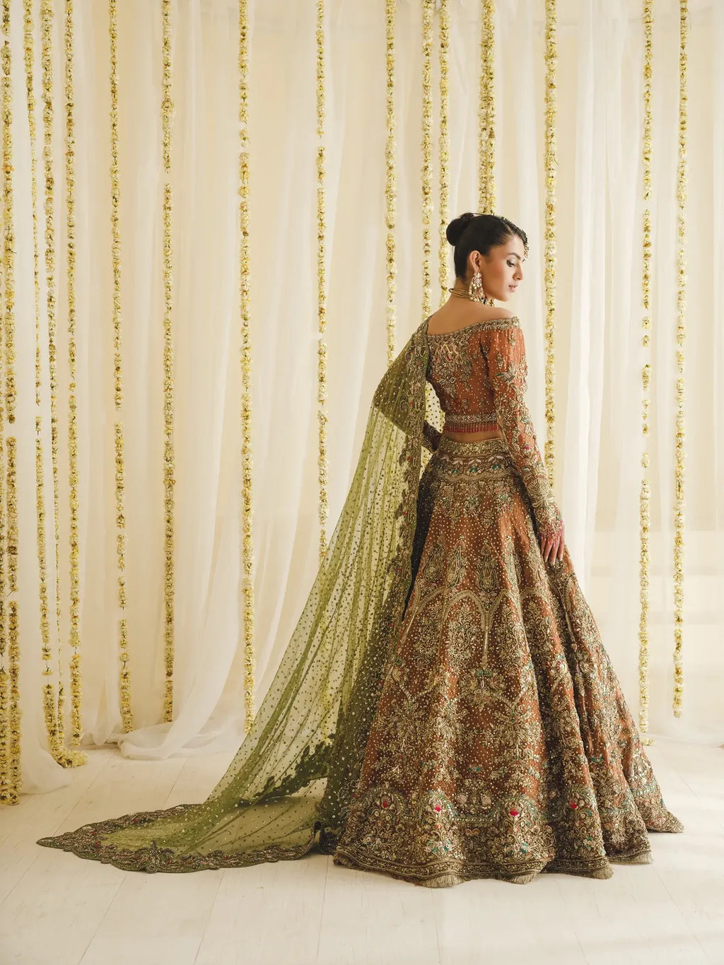 Rust olive bridal lehenga
