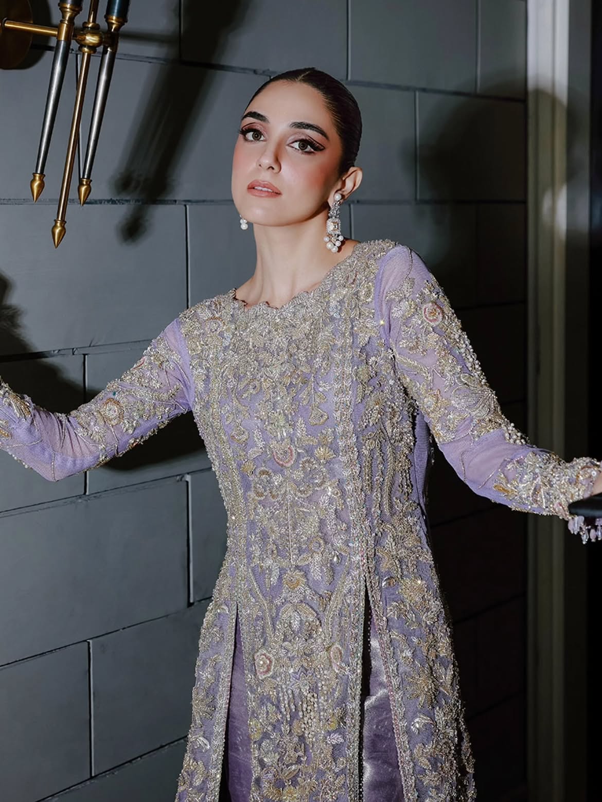 Lavender flared pants and open-cut gown