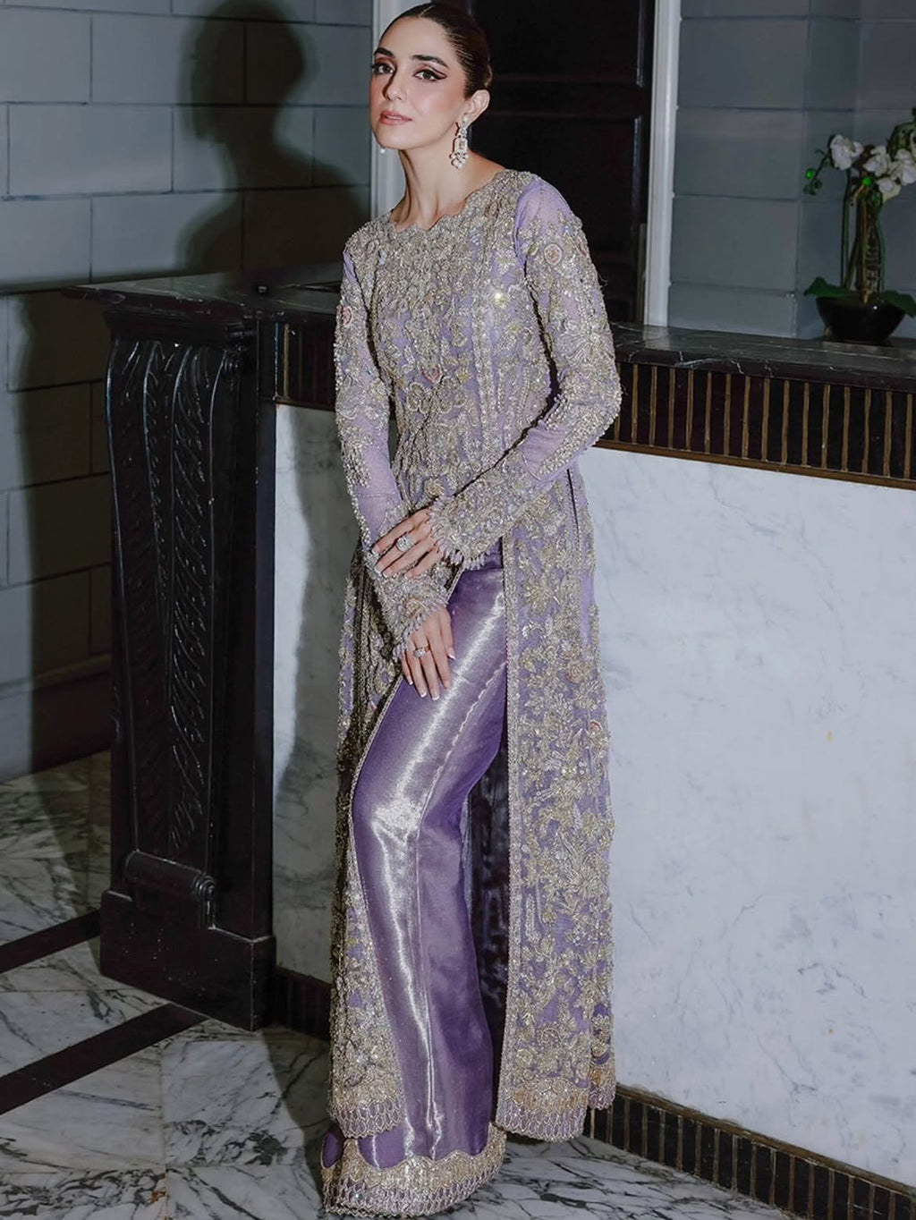 Lavender flared pants and open-cut gown