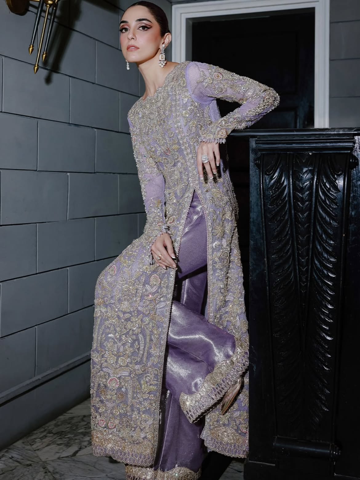 Lavender flared pants and open-cut gown