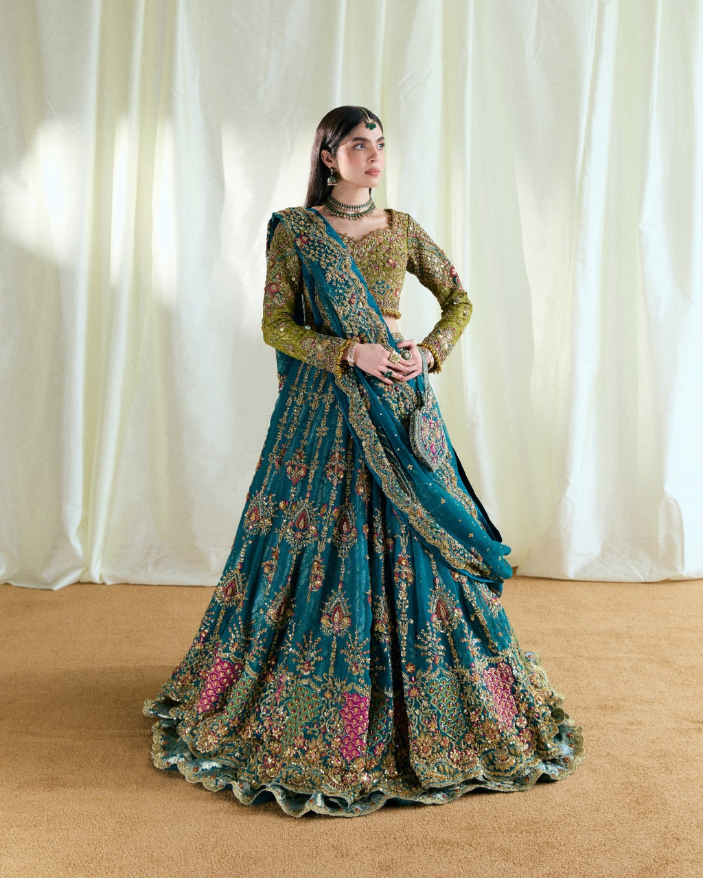 Peacock teal and olive bridal lehenga