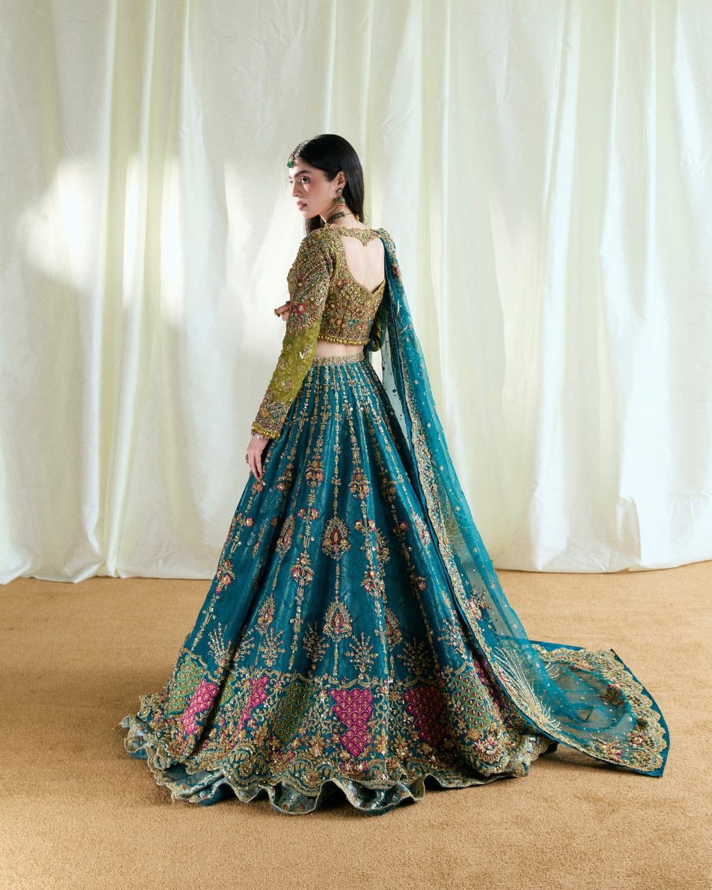 Peacock teal and olive bridal lehenga