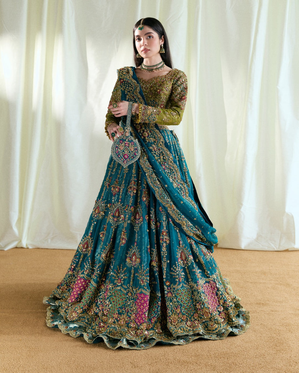 Peacock teal and olive bridal lehenga