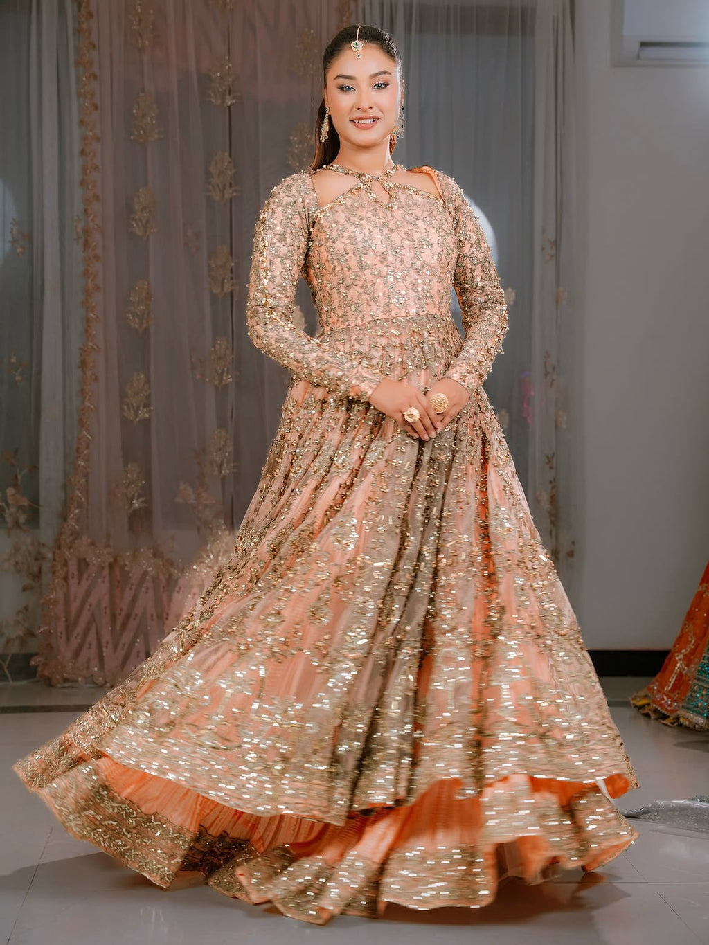 peachy pearly bridal lehenga