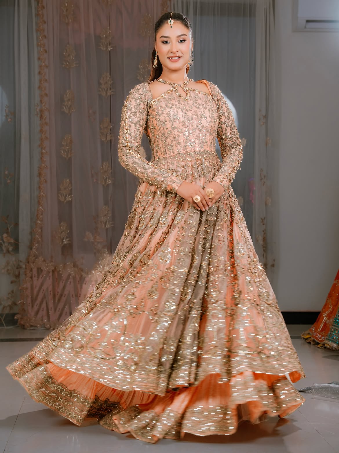 peachy pearly bridal lehenga